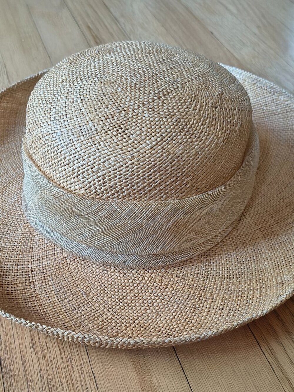 Woman's summer straw hat fits medium to large head.